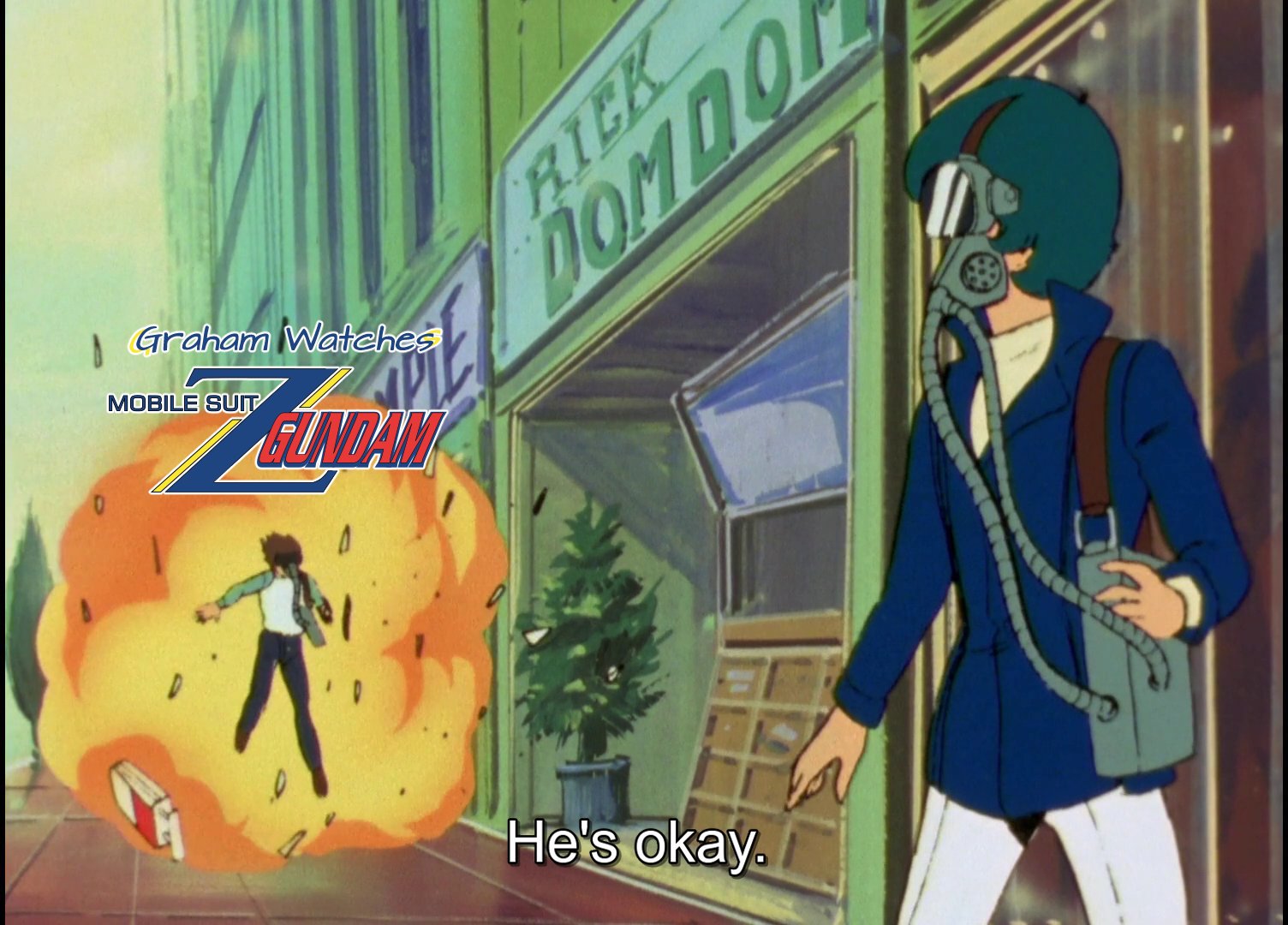Kamille looking back as a man is caught in an explosion.  Subtitles: He's okay.  Title card.