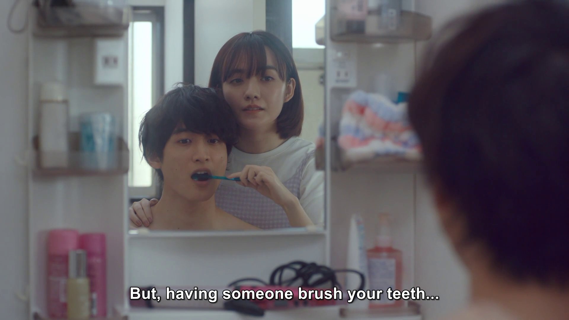 Matsuda, getting his teeth brushed by Ako.  Matsuda thinking: But, having someone brush your teeth