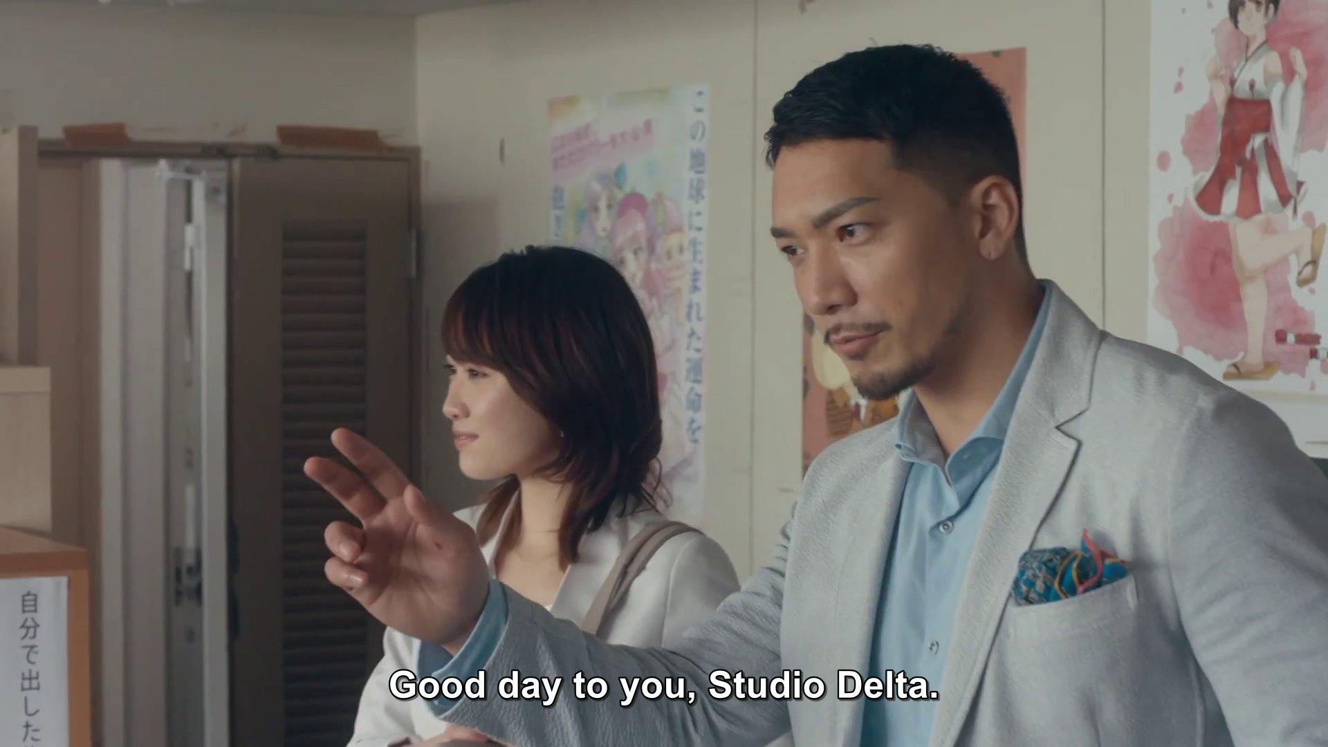 Shiraki, played by SWAY, a man with a light suit and goatee: Good day to you, Studio Delta