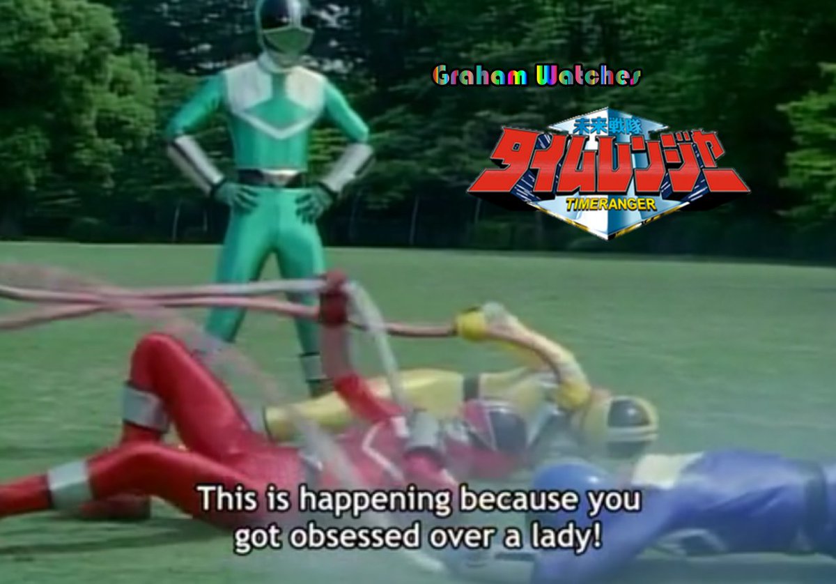 Graham watches Mirai Sentai Timeranger.  Green standing over the other male rangers subtitles: This is happening because you got obsessed over a lady!