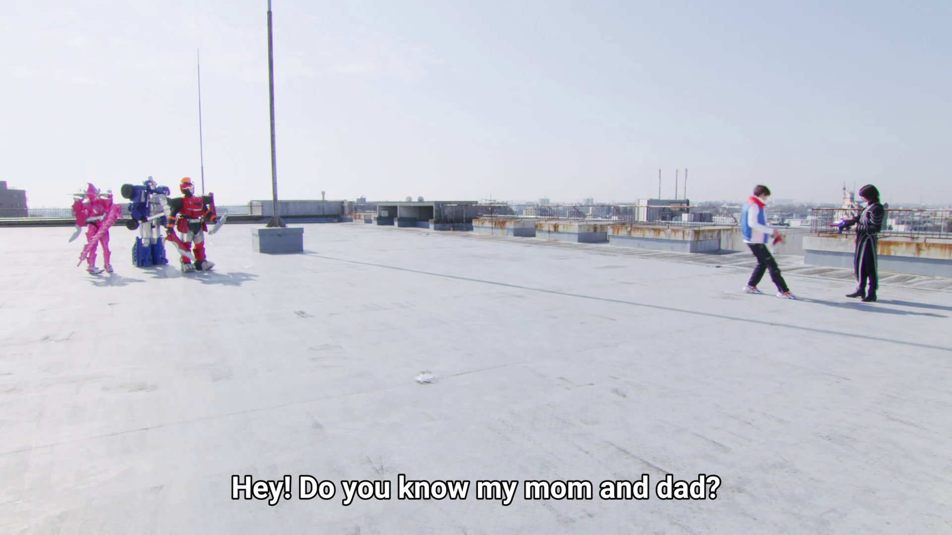 Zyuran, Magine, and Vroon on the rooftop, some distance from where Kaito and Stacey are.  Kaito: Hey! Do you know my mom and dad?